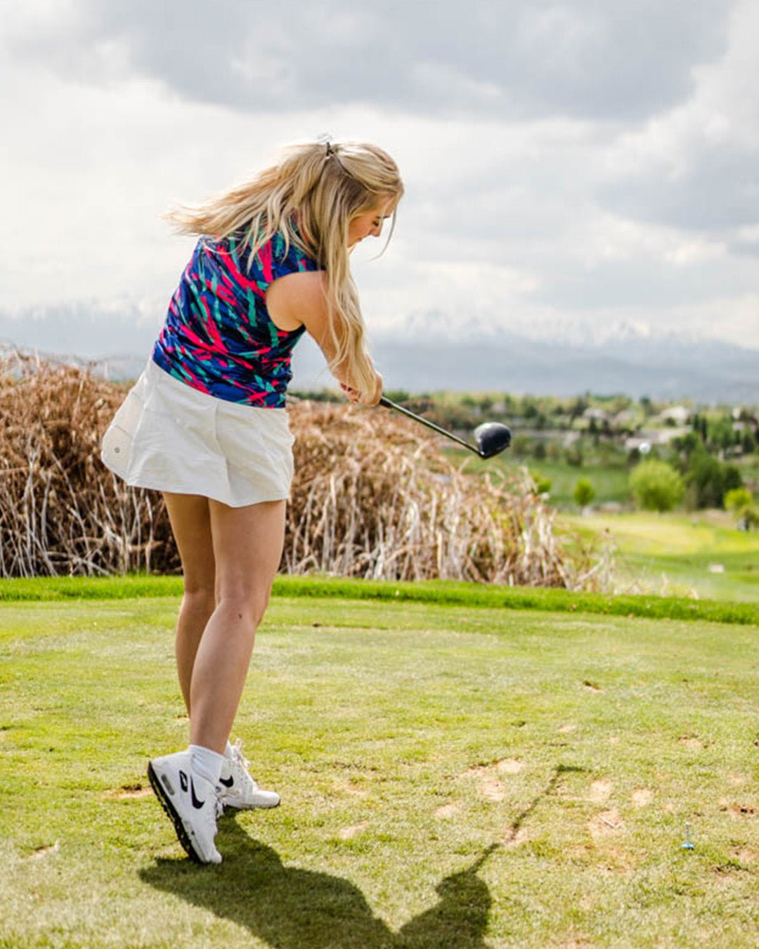 8-Track Women's Sleeveless Golf Polo - Yatta Golf